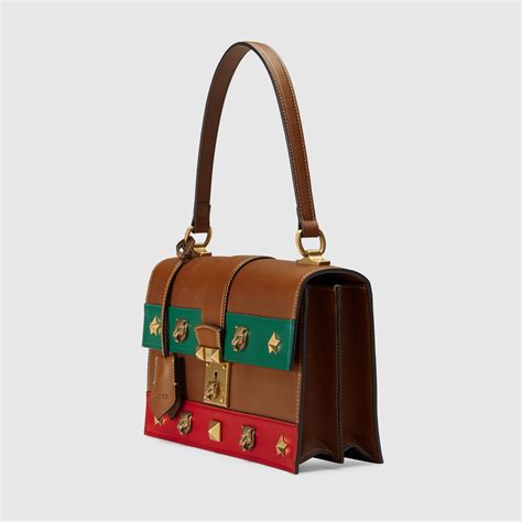 gucci cat lock leather top handle 421997 brown satchel|saks Gucci handbags.